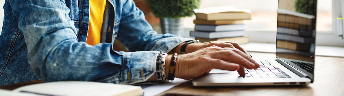 CPD Webinar Man Typing On Laptop