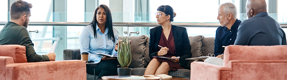 Group Of People In A Meeting
