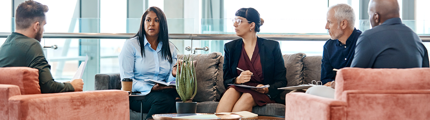 Group Of People In A Meeting